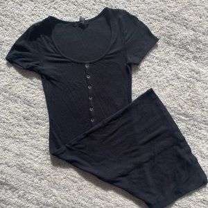 Short sleeve black ribbed mini dress with faux buttons